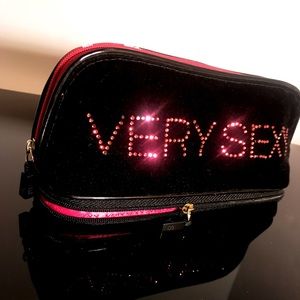 Black make-up bag with bottom brush compartment